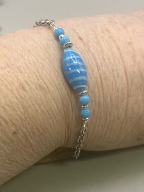 Light Blue Striped Glass Bead Bracelet with Silver Accents